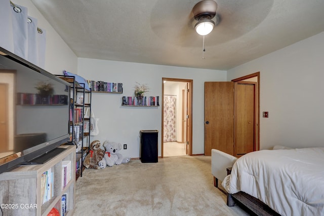 610 N Madison St, Webb City, MO 64870 - carpeted bedroom featuring ceiling fan and connected bathroom