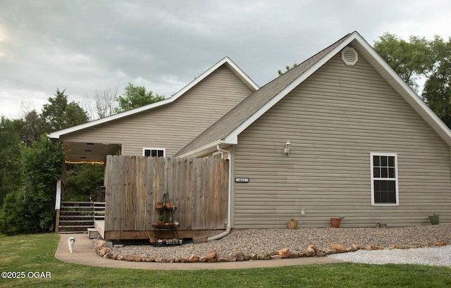411 N Main St, Diamond, MO 64840 - view of side of home with a wooden deck