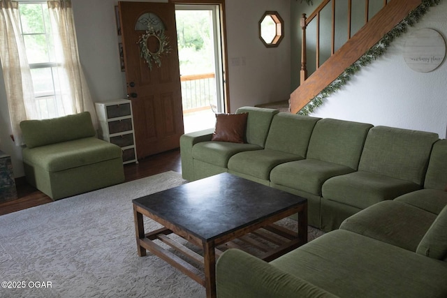 411 N Main St, Diamond, MO 64840 - living room with healthy amount of natural light, stairway, and wood finished floors