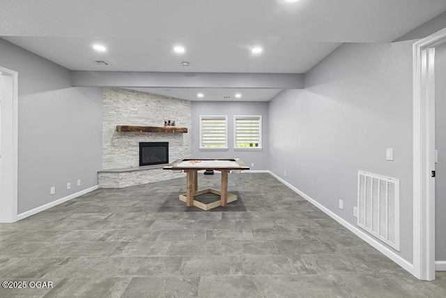 3802 Fawn Trl, Joplin, MO 64804 - unfurnished living room with a fireplace, baseboards, and recessed lighting