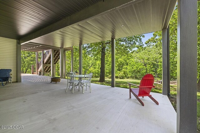 3802 Fawn Trl, Joplin, MO 64804 - view of patio / terrace with stairs and outdoor dining space