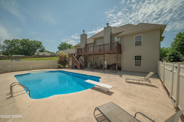 20951 Jasmine Ln, Webb City, MO 64870 - view of swimming pool featuring stairs, a deck, a fenced backyard, a patio area, and a diving board