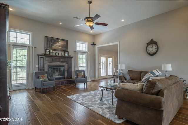 20951 Jasmine Ln, Webb City, MO 64870 - living room featuring a glass covered fireplace, ceiling fan, hardwood / wood-style floors, and recessed lighting