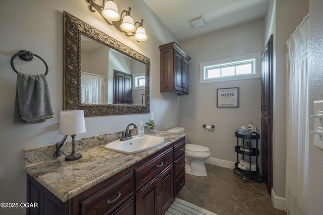 20951 Jasmine Ln, Webb City, MO 64870 - bathroom featuring vanity, toilet, tile patterned flooring, baseboards, and a shower with curtain