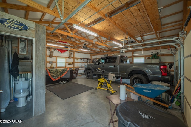 20951 Jasmine Ln, Webb City, MO 64870 - garage with a garage door opener
