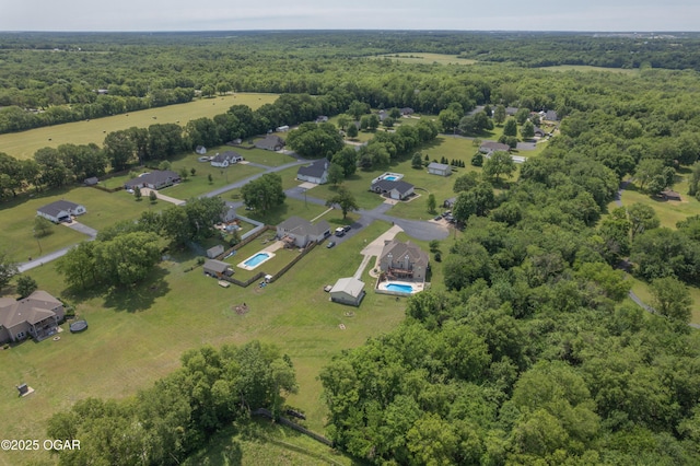 20951 Jasmine Ln, Webb City, MO 64870 - view of property location featuring a forest and a pool area
