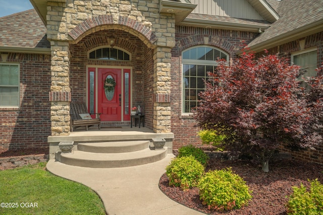 20951 Jasmine Ln, Webb City, MO 64870 - entrance to property featuring brick siding, a shingled roof, board and batten siding, and stone siding