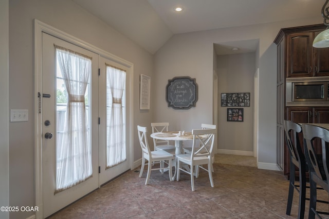 20951 Jasmine Ln, Webb City, MO 64870 - dining room with lofted ceiling, baseboards, and recessed lighting