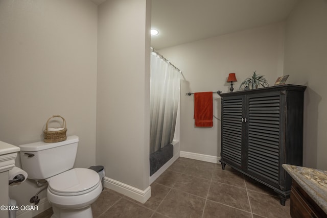 20951 Jasmine Ln, Webb City, MO 64870 - bathroom with vanity, toilet, tile patterned floors, baseboards, and shower / bath combo