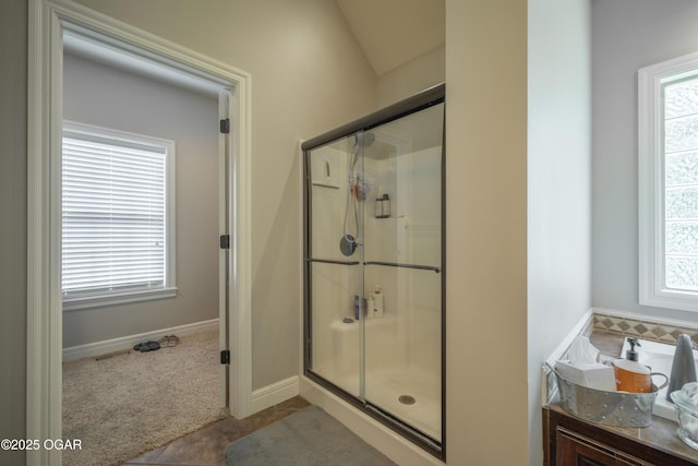 20951 Jasmine Ln, Webb City, MO 64870 - full bathroom with a stall shower, vanity, tile patterned flooring, and baseboards