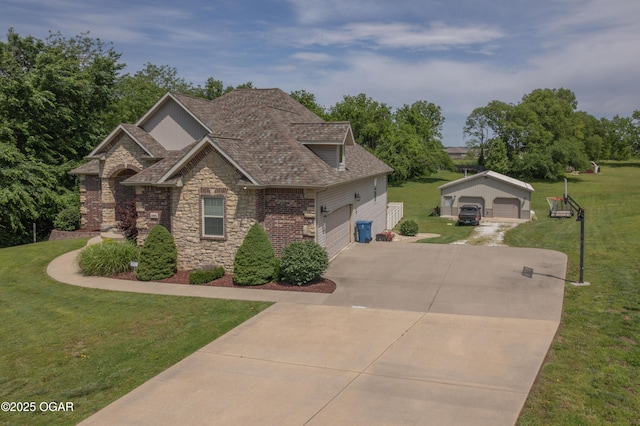 20951 Jasmine Ln, Webb City, MO 64870 - view of front of property with stone siding, a front yard, an outbuilding, a garage, and concrete driveway