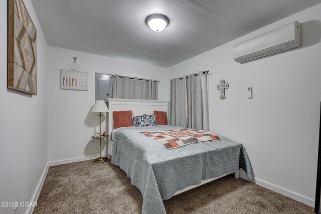 514 S Brownell Ave, Joplin, MO 64801 - carpeted bedroom with a wall mounted air conditioner and baseboards