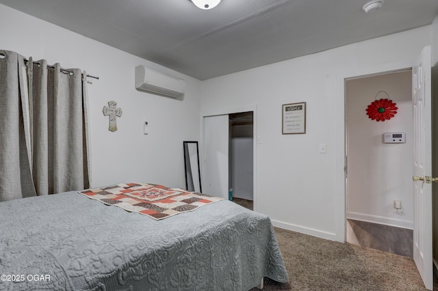 514 S Brownell Ave, Joplin, MO 64801 - carpeted bedroom featuring a wall mounted AC, baseboards, and a closet