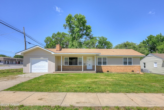 3124 Missouri Ave, Joplin, MO 64804 - ranch-style house with an attached garage, brick siding, a porch, and a front yard