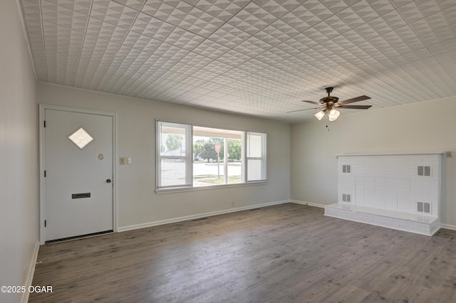 3124 Missouri Ave, Joplin, MO 64804 - entryway featuring ceiling fan, wood finished floors, and baseboards