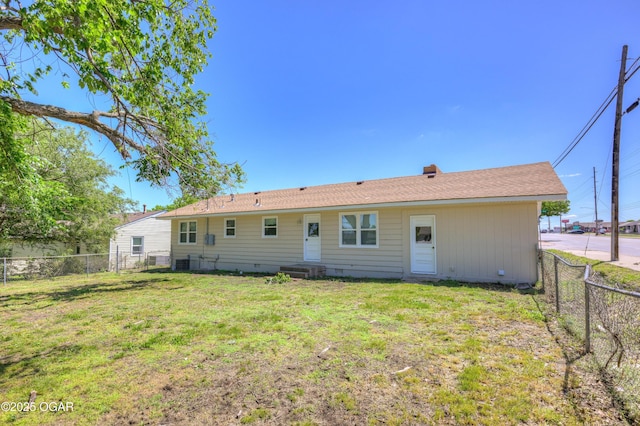 3124 Missouri Ave, Joplin, MO 64804 - rear view of property featuring crawl space, a chimney, and central AC
