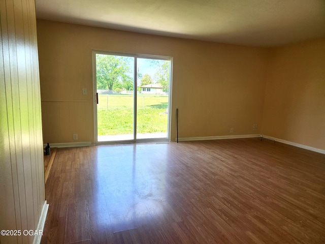 2432 S Florida, Joplin, MO 64804 - unfurnished room featuring wood finished floors and baseboards