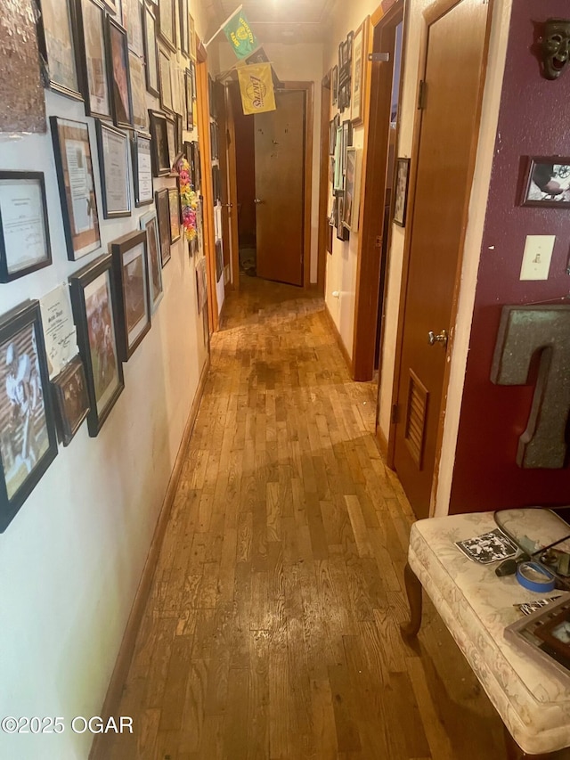 408 Beaver St, Anderson, MO 64831 - hall with light wood-type flooring and baseboards