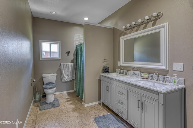 4850 S Chapel Rd, Carthage, MO 64836 - full bath featuring baseboards, double vanity, toilet, recessed lighting, and a shower with curtain