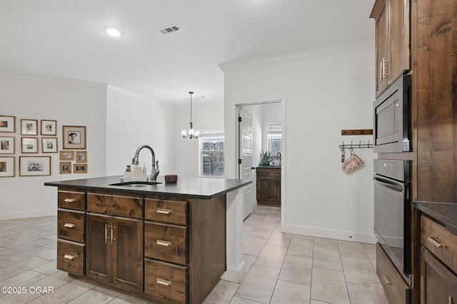 104 Van Dusen Dr, Carl Junction, MO 64834 - kitchen featuring a sink, oven, dark countertops, crown molding, and black microwave