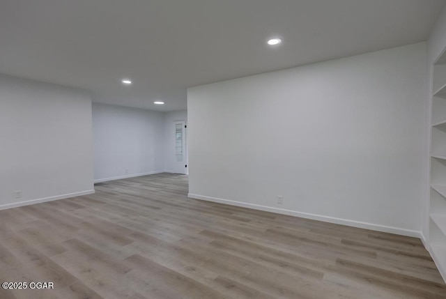 328 E 33rd St, Joplin, MO 64804 - unfurnished room with recessed lighting, wood finished floors, and baseboards