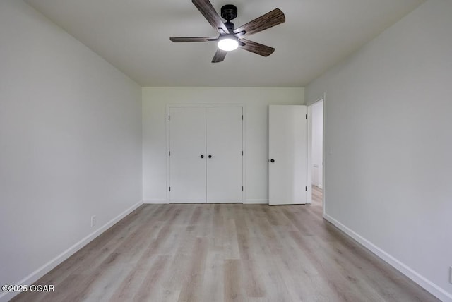 328 E 33rd St, Joplin, MO 64804 - unfurnished bedroom with light wood-style floors, baseboards, a closet, and a ceiling fan