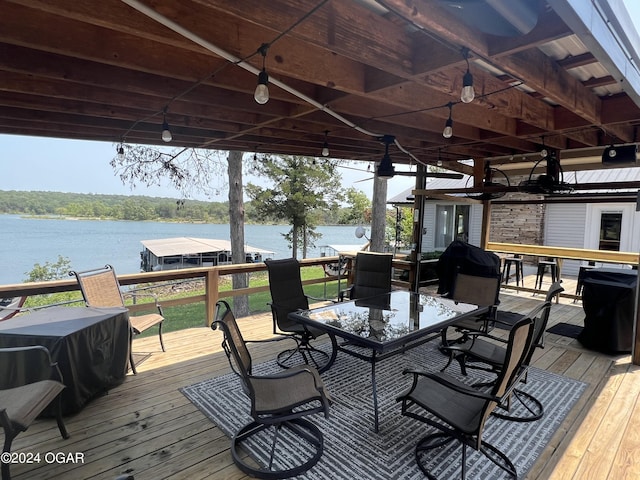 21937 Lake Rd Unit M-12, Cassville, MO 65625 - wooden terrace with a water view and outdoor dining space