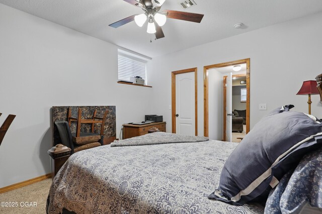 702 Copper Oaks Dr, Carl Junction, MO 64834 - bedroom featuring baseboards, a ceiling fan, and carpet flooring