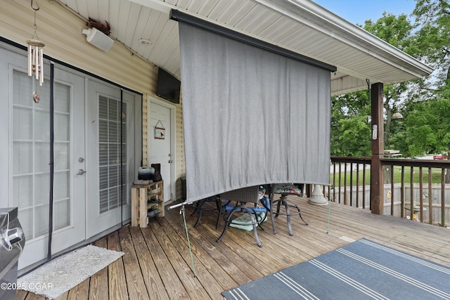 702 Copper Oaks Dr, Carl Junction, MO 64834 - wooden terrace with french doors