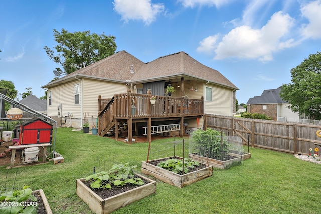 702 Copper Oaks Dr, Carl Junction, MO 64834 - back of house featuring a garden, a deck, stairway, and roof with shingles