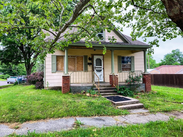 402 N Connor Ave, Joplin, MO 64801 - bungalow featuring covered porch and roof with shingles