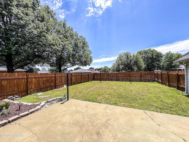 706 E Centennial E, Centennial, Pittsburg, KS 66762 - view of yard with a patio