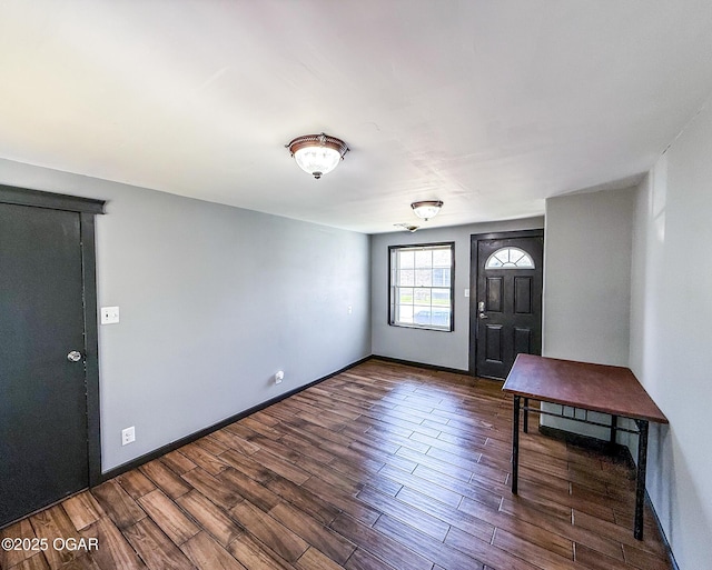706 E Centennial E, Centennial, Pittsburg, KS 66762 - entrance foyer featuring wood finished floors and baseboards