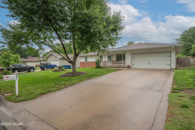 3431 Hawthorn Dr, Joplin, MO 64804 - ranch-style house featuring an attached garage, concrete driveway, brick siding, and covered porch