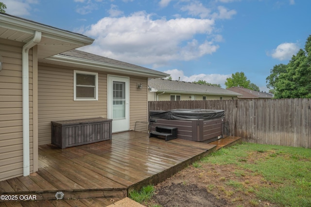 3431 Hawthorn Dr, Joplin, MO 64804 - wooden deck featuring a hot tub and a fenced backyard