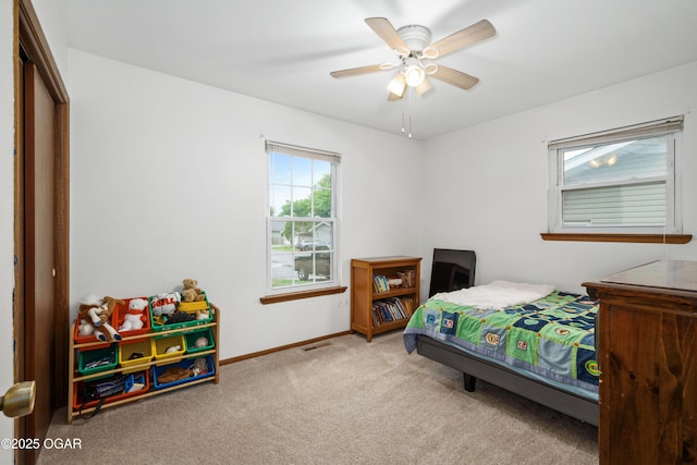 3431 Hawthorn Dr, Joplin, MO 64804 - bedroom with carpet floors, baseboards, and a ceiling fan