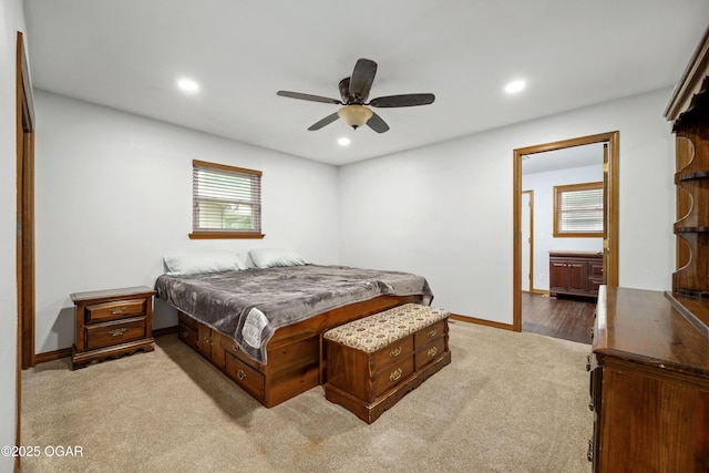 3431 Hawthorn Dr, Joplin, MO 64804 - bedroom featuring light carpet, multiple windows, recessed lighting, baseboards, and a ceiling fan