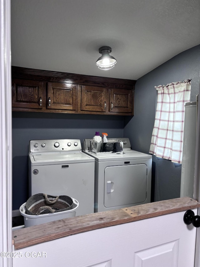 324 W Hill St, Neosho, MO 64850 - laundry room with washing machine and clothes dryer and cabinet space