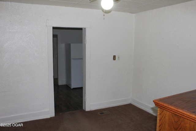 1417 S Jackson Ave, Joplin, MO 64804 - empty room featuring ceiling fan, carpet floors, and baseboards