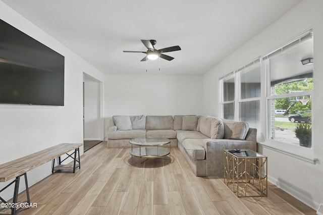 2722 Wisconsin Ave, Joplin, MO 64804 - living room with ceiling fan, wood finished floors, and baseboards