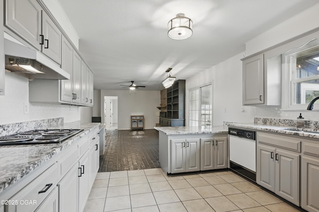 2722 Wisconsin Ave, Joplin, MO 64804 - kitchen with white dishwasher, cooktop, gray cabinets, and a ceiling fan