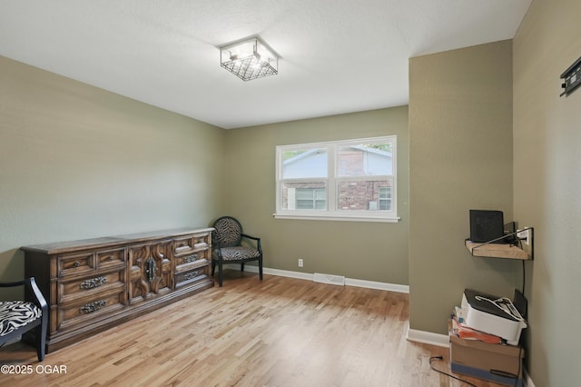 2722 Wisconsin Ave, Joplin, MO 64804 - sitting room featuring wood finished floors and baseboards