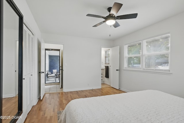 2722 Wisconsin Ave, Joplin, MO 64804 - bedroom with light wood-style flooring, baseboards, a ceiling fan, and a closet