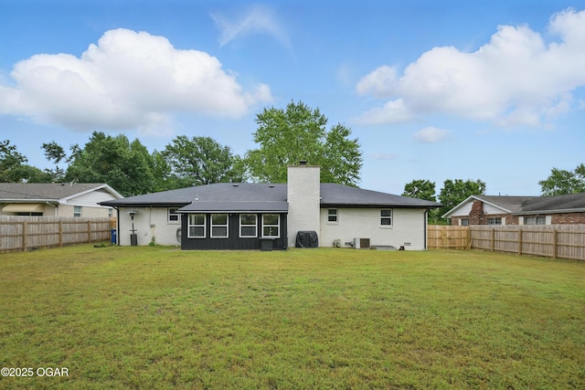2722 Wisconsin Ave, Joplin, MO 64804 - rear view of property featuring a chimney and central AC
