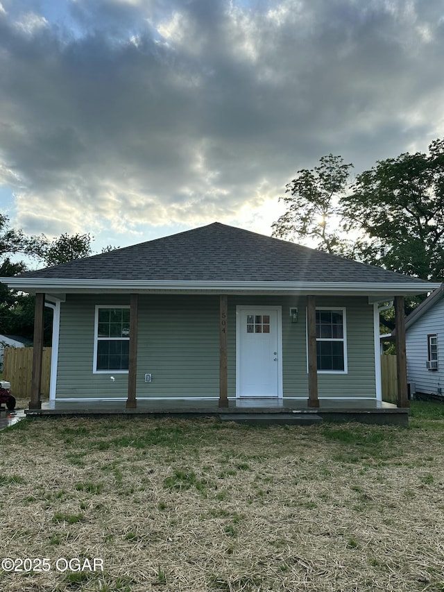 504 S Mckinley Ave, Joplin, MO 64801 - bungalow-style house with a shingled roof and covered porch