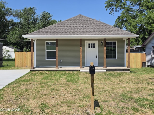 504 S Mckinley Ave, Joplin, MO 64801 - view of front of property featuring roof with shingles and a porch