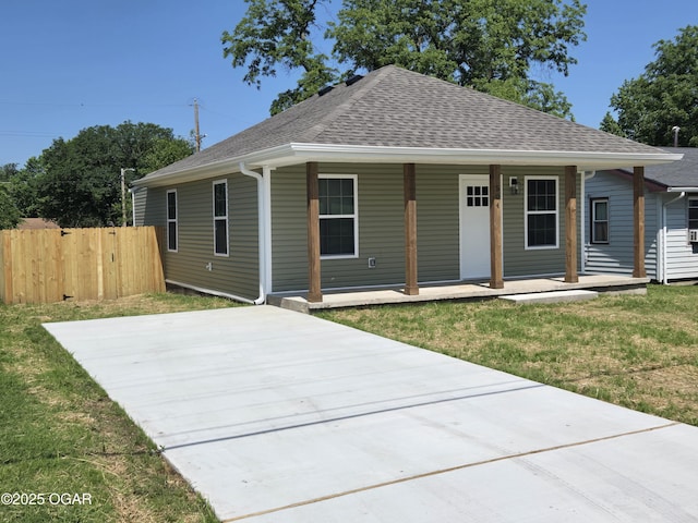 504 S Mckinley Ave, Joplin, MO 64801 - view of front of home with roof with shingles and a porch