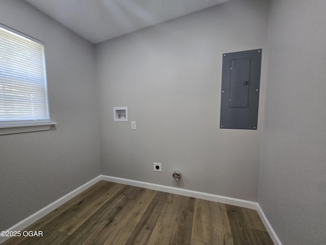 504 S Mckinley Ave, Joplin, MO 64801 - laundry room with electric panel, hookup for an electric dryer, wood finished floors, hookup for a washing machine, and baseboards