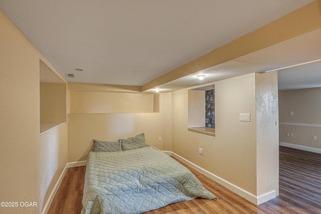 2502 S Tyler Ave, Joplin, MO 64804 - bedroom featuring wood finished floors and baseboards