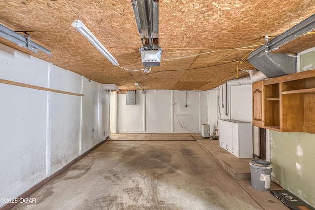 2502 S Tyler Ave, Joplin, MO 64804 - garage with electric panel and a garage door opener